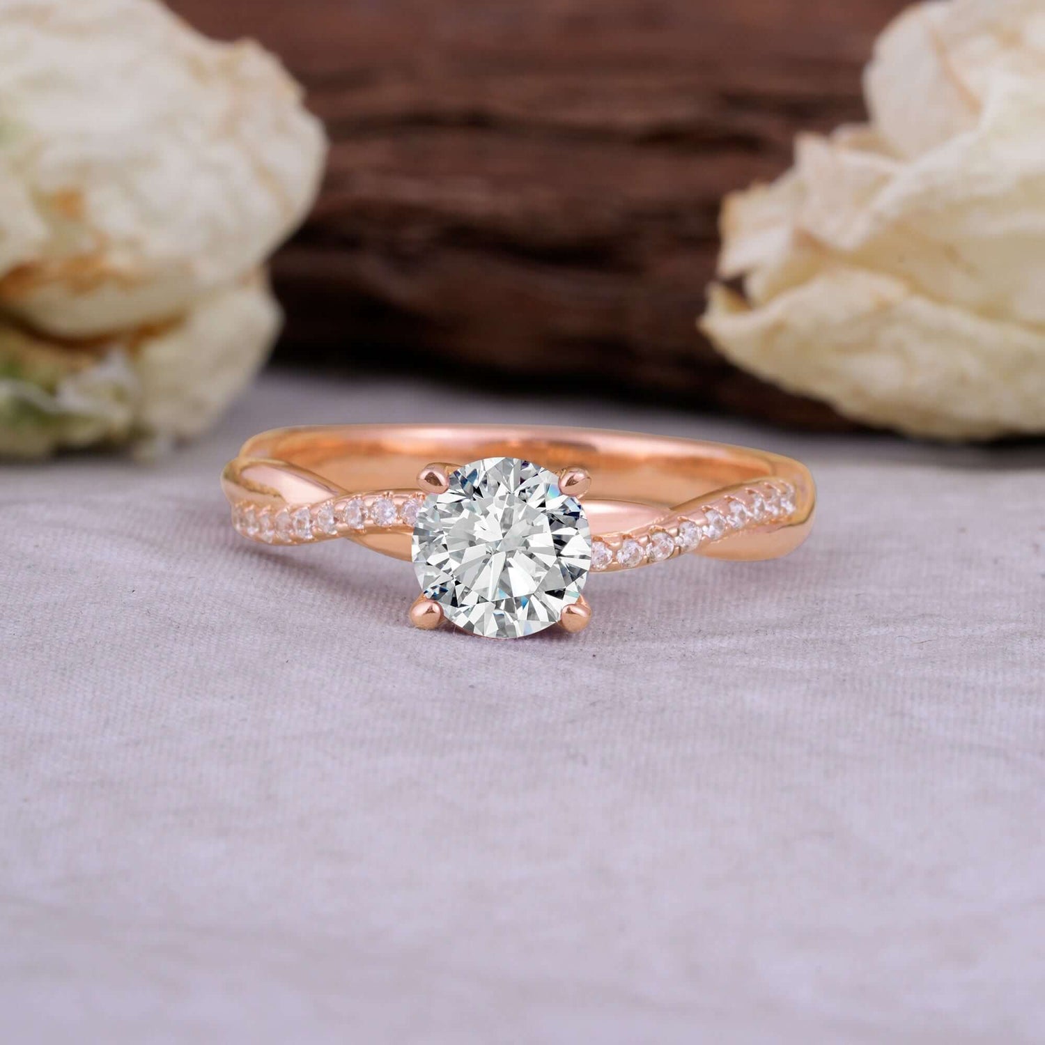 Classic Round Cut Lab Diamond Engagement Ring with Twisted Band featuring a sparkling round diamond and elegant twisted band design.