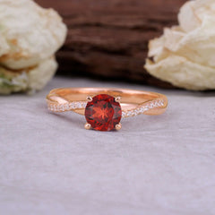 Classic Round Cut Garnet Engagement Ring with Twisted Band