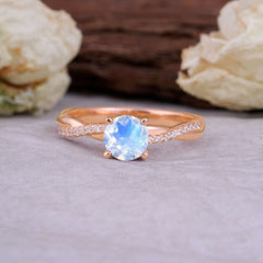 Classic Round Cut Moonstone Engagement Ring with Twisted Band
