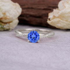 Classic Round Cut Sapphire Engagement Ring with Twisted Band
