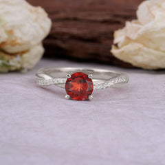Classic Round Cut Garnet Engagement Ring with Twisted Band