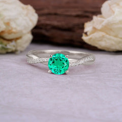 Classic Round Cut Emerald Engagement Ring with Twisted Band