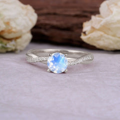 Classic Round Cut Moonstone Engagement Ring with Twisted Band