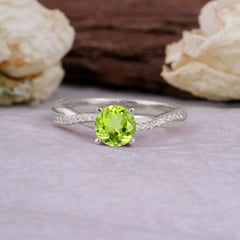 Classic Round Cut Peridot Engagement Ring with Twisted Band