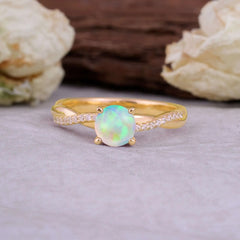 Classic Round Cut Opal Engagement Ring with Twisted Band