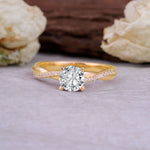 Classic Round Cut Lab Diamond Engagement Ring with Twisted Band on a neutral background with floral decor.