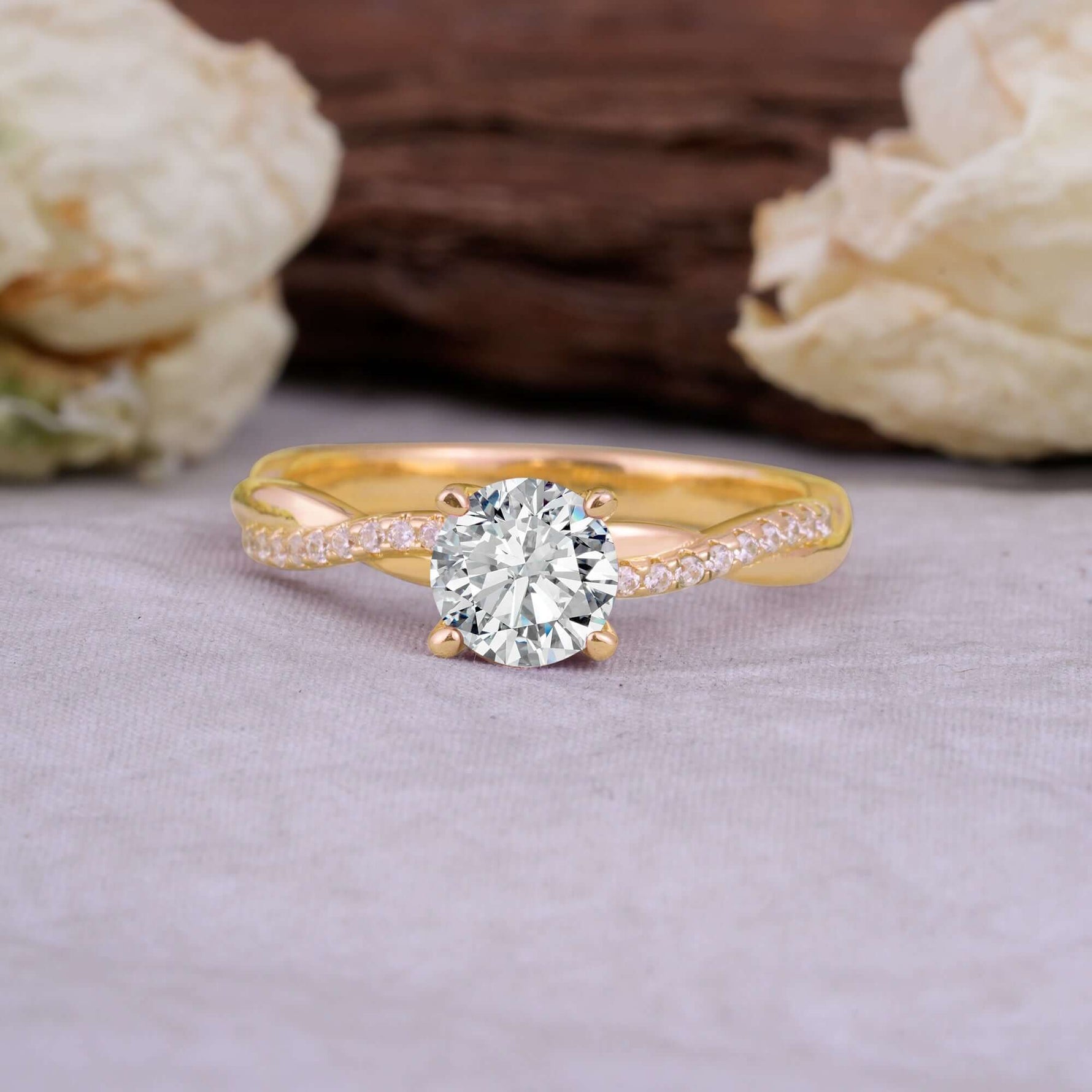 Classic Round Cut Lab Diamond Engagement Ring with Twisted Band on a neutral background with floral decor.