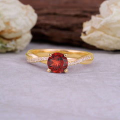 Classic Round Cut Garnet Engagement Ring with Twisted Band