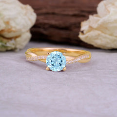 Classic Round Cut Aquamarine Engagement Ring with Twisted Band