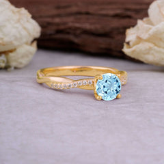 Classic Round Cut Aquamarine Engagement Ring with Twisted Band