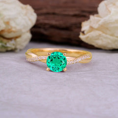 Classic Round Cut Emerald Engagement Ring with Twisted Band