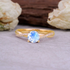 Classic Round Cut Moonstone Engagement Ring with Twisted Band