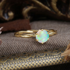 Round Cut Opal Timeless Solitaire Engagement Ring with Twisted Band
