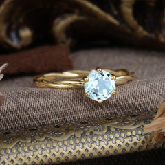 Round Cut Aquamarine Timeless Solitaire Engagement Ring with Twisted Band