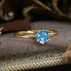 Round Cut Aquamarine Timeless Solitaire Engagement Ring with Twisted Band