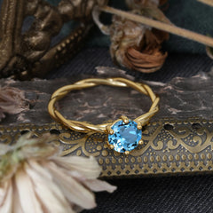 Round Cut Aquamarine Timeless Solitaire Engagement Ring with Twisted Band