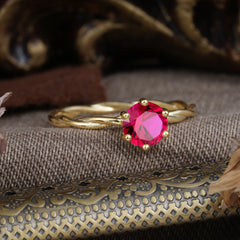 Round Cut Ruby Timeless Solitaire Engagement Ring with Twisted Band