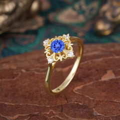 Romantic Vintage 4-Prong Round Cut Sapphire Ring