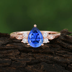 3 Prong Pear Cut Classic Lab Grown Sapphire Engagement Ring with Side Stone