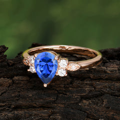 3 Prong Pear Cut Classic Lab Grown Sapphire Engagement Ring with Side Stone