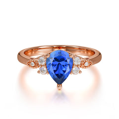 3 Prong Pear Cut Classic Lab Grown Sapphire Engagement Ring with Side Stone