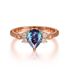 Pear Cut Classic Alexandrite Engagement Ring with Side Stone