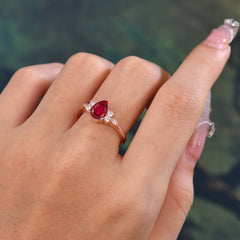 Pear Cut Classic Ruby Engagement Ring with Side Stone