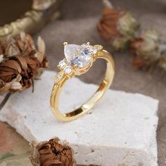 3 Prong Pear Cut Classic Lab Grown Moissanite Engagement Ring with Side Stone