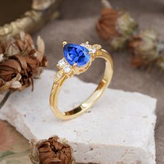 3 Prong Pear Cut Classic Lab Grown Sapphire Engagement Ring with Side Stone