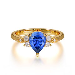 3 Prong Pear Cut Classic Lab Grown Sapphire Engagement Ring with Side Stone