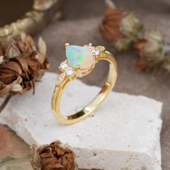 3 Prong Pear Cut Classic Lab Grown Opal Engagement Ring with Side Stone
