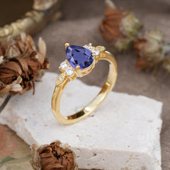 3 Prong Pear Cut Classic Lab Grown Tanzanite Engagement Ring with Side Stone