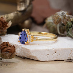 3 Prong Pear Cut Classic Lab Grown Tanzanite Engagement Ring with Side Stone