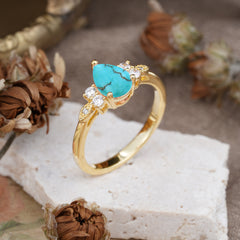 3 Prong Pear Cut Classic Turquoise Engagement Ring with Side Stone