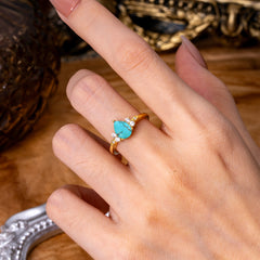 3 Prong Pear Cut Classic Turquoise Engagement Ring with Side Stone