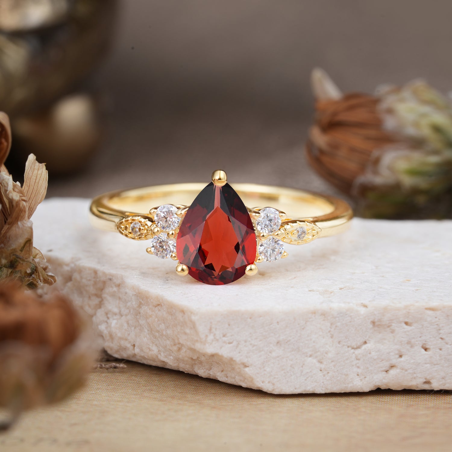 3 Prong Pear Cut Classic Garnet Engagement Ring with Side Stone