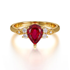 Pear Cut Classic Ruby Engagement Ring with Side Stone
