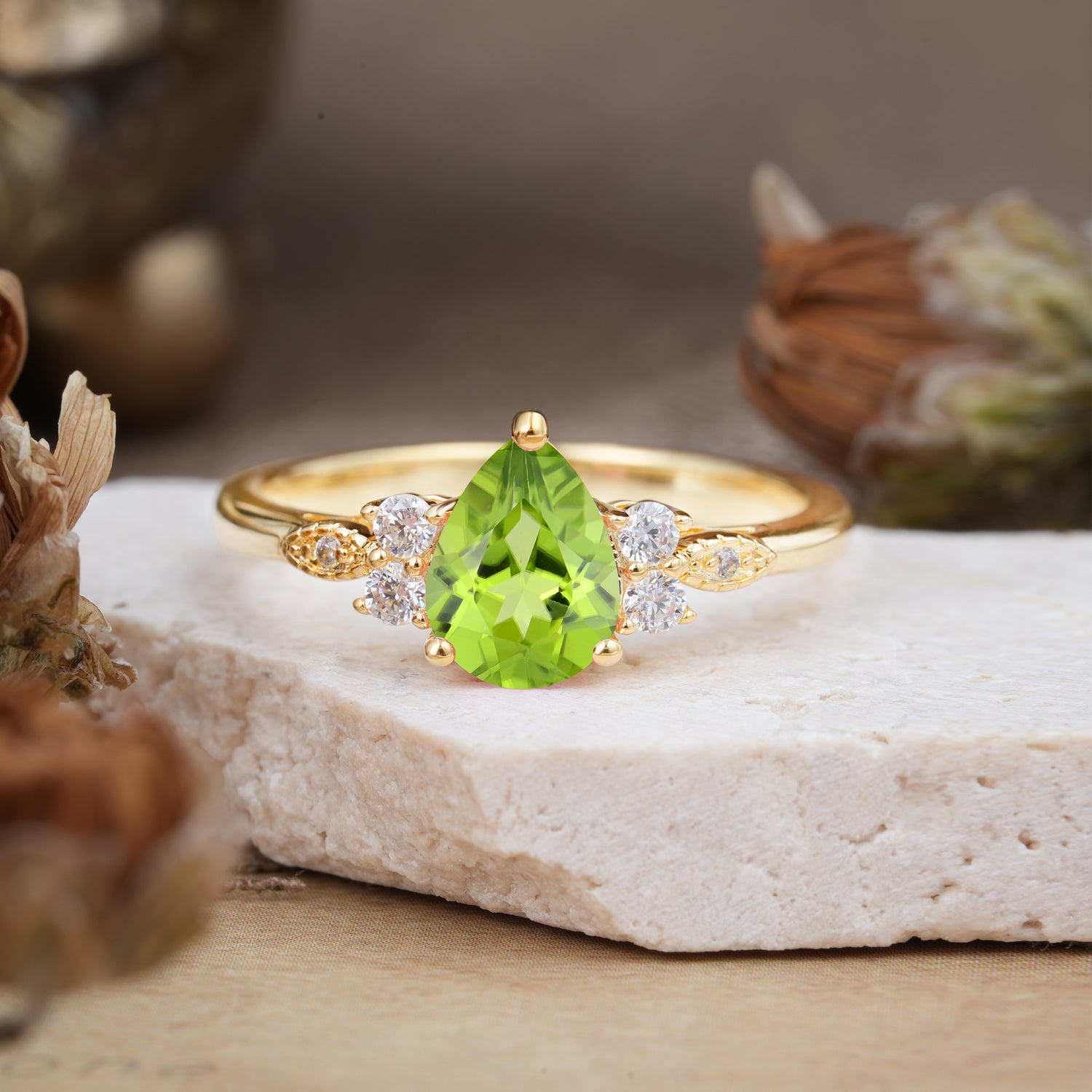 3 Prong Pear Cut Classic Peridot Engagement Ring with Side Stone