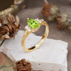 3 Prong Pear Cut Classic Lab Grown Peridot Engagement Ring with Side Stone