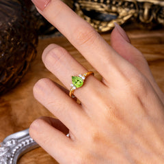 3 Prong Pear Cut Classic Peridot Engagement Ring with Side Stone