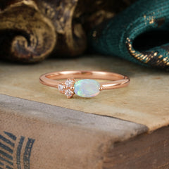 Oval Cut Opal Ring 0.5ct with Side Stone Delicate Design