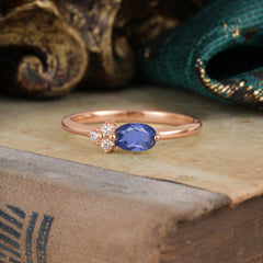 0.5ct Oval Cut Tanzanite Ring with Side Stones for Her