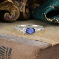 0.5ct Oval Cut Tanzanite Ring with Side Stones for Her