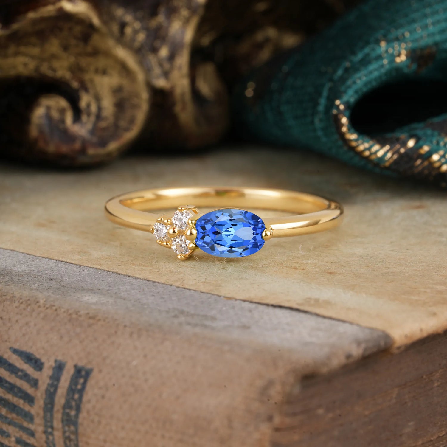 2 Prong Sapphire Oval Cut Engagement Ring with Sparkly Side Stones for Her
