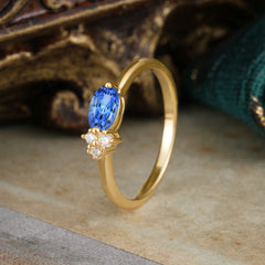 2 Prong Sapphire Oval Cut Ring with Sparkly Side Stones for Her