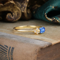 2 Prong Sapphire Oval Cut Ring with Sparkly Side Stones for Her