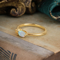 Oval Cut Opal Ring 0.5ct with Side Stone Delicate Design