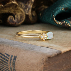 Oval Cut Opal Ring 0.5ct with Side Stone Delicate Design