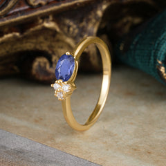 0.5ct Oval Cut Tanzanite Ring with Side Stones for Her