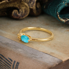 0.5ct Oval Cut Turquoise Ring with Side Stones for Her